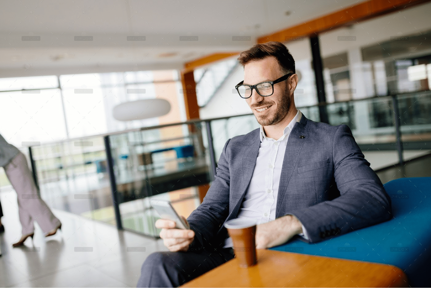 demo-attachment-46-businessman-taking-a-break-with-a-cup-of-coffee-JW4B3DH